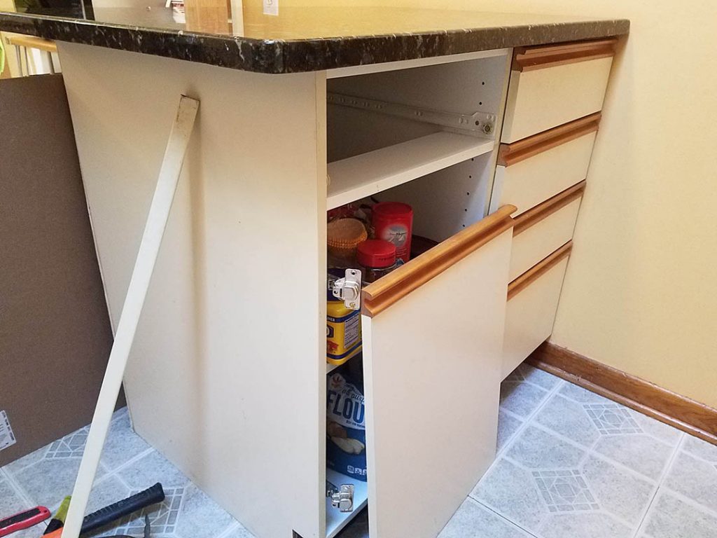 prepping a kitchen island for painting