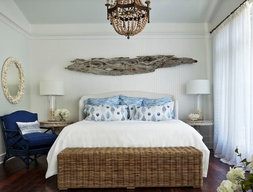 Coastal Bedroom with wicker, driftwood wall hanging and seashell mirror