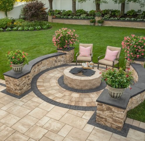 round stone fire pit in stonme patio