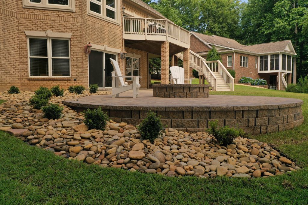 Stone fire pit ideas with matching patio