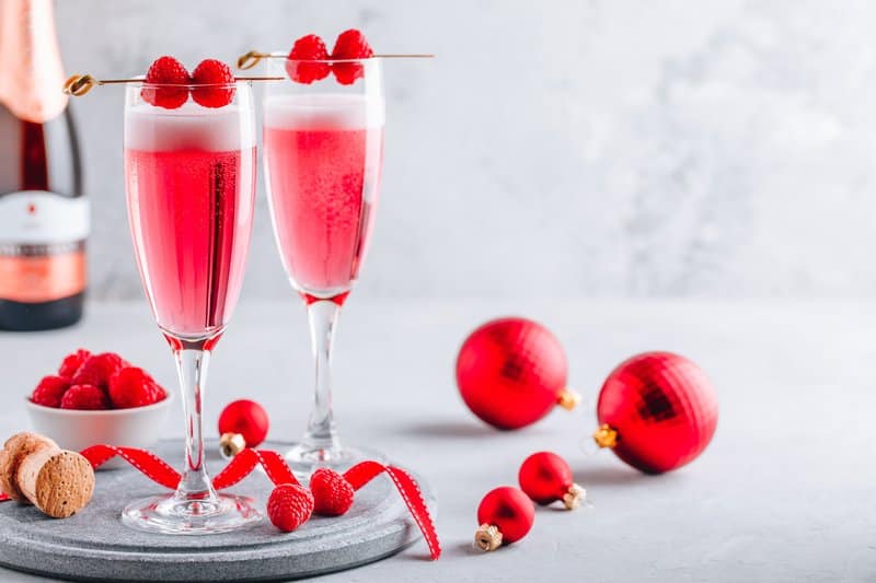 Add homemade raspberry syrup to prosecco