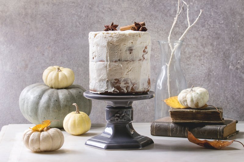 fall-themed vignette for a cake