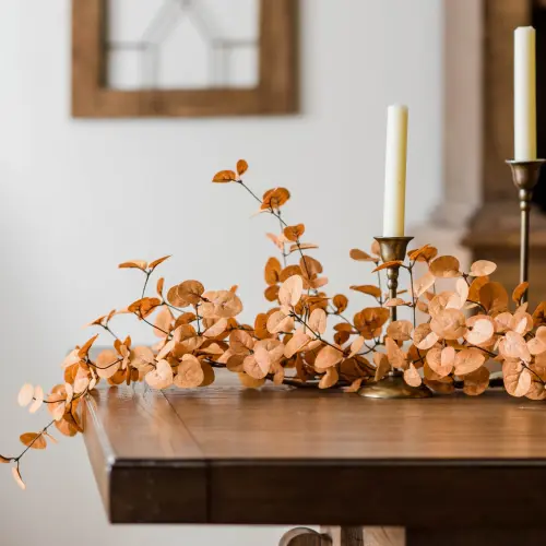 Elegant fall vignette with eucalyptus garland