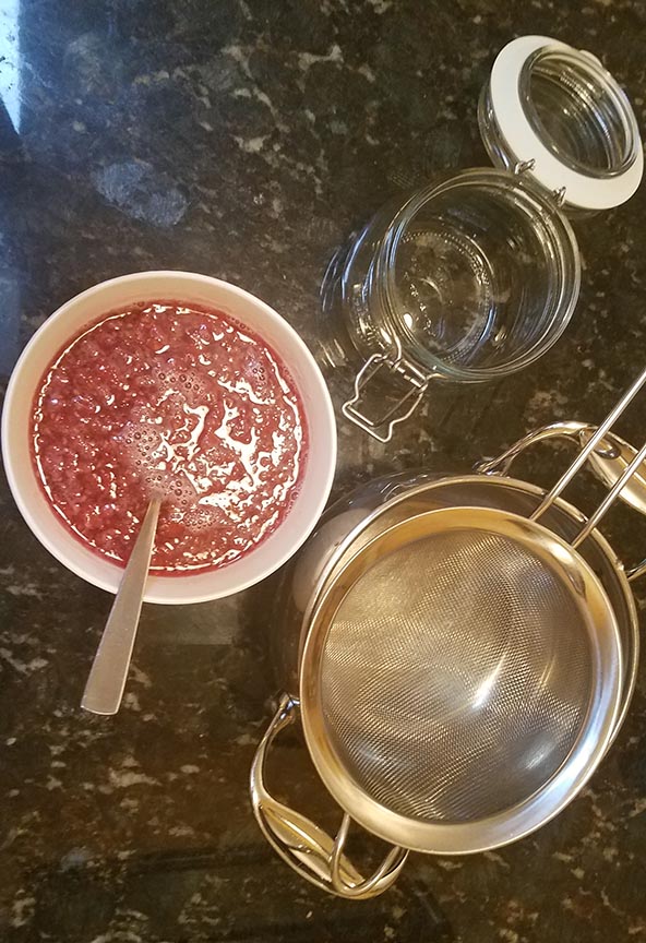 Straining the Raspberry Syrup